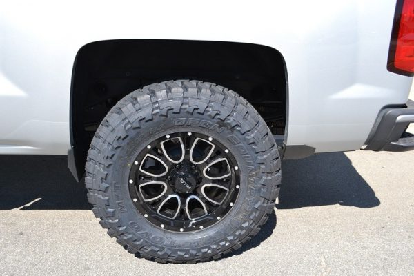 4.5" CST Lift istalled with 35x12.5" tires and 18x9" wheels with a 5.71" back-spacing. No trimming.